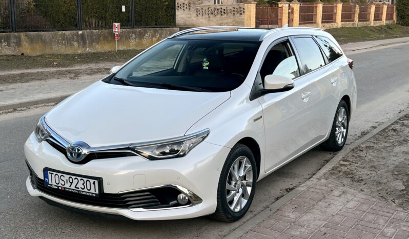 TOYOTA AURIS II 1.8 HYBRID 136KM – AUTOMAT – KAMERA – NAVI – SERWIS ASO – PARKTRONIC full