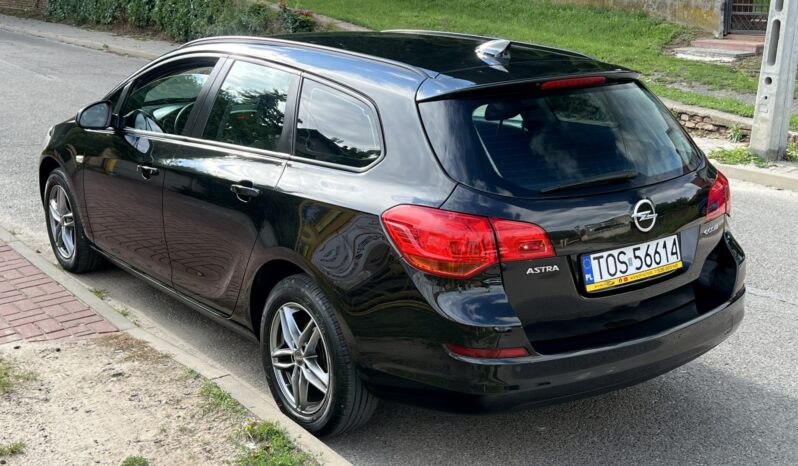 OPEL ASTRA J 1.4 BENZYNA 100KM KOMBI – KLIMA – TEMPOMAT – CZUJNIKI COFANIA full