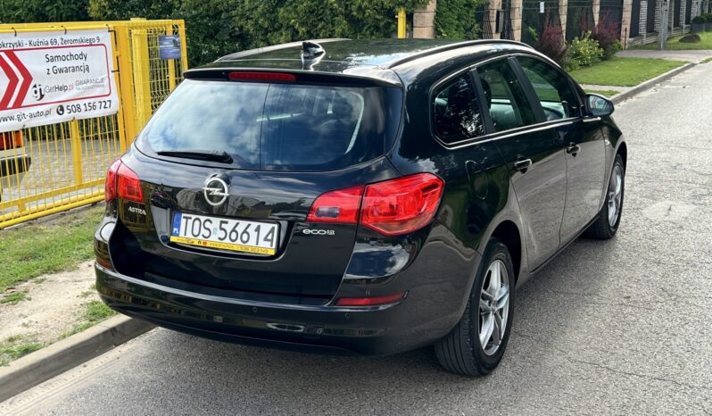 OPEL ASTRA J 1.4 BENZYNA 100KM KOMBI – KLIMA – TEMPOMAT – CZUJNIKI COFANIA full